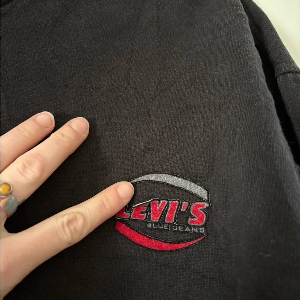 Vintage Levi’s embroidered V neck sweatshirt